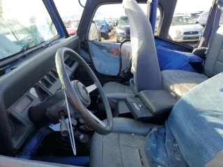 1995 Jeep Wrangler S with VIN 1J4FY19P8SP242032, listed as a Copart auction lot 79724804 with 142,588 mi miles and Clean Title. Bid and sale history available at carsss.com. Image 7.