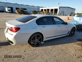 2016 BMW 7 Series 750i xDrive with VIN WBA7B0C59GG526741, listed as a Copart auction lot 86312384 with 90,360 mi miles and Salvage title. Bid and sale history available at DreamBid. Image 3.