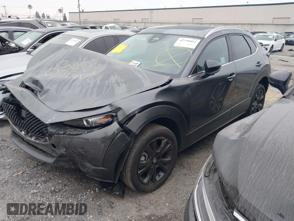 2024 Mazda CX-30 Premium Plus with VIN 3MVDMBEY1RM720111, listed as a IAAI auction lot 42730412 with 3,988 mi miles and . Bid and sale history available at DreamBid. Image 2.