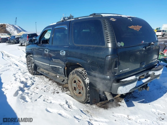 2002 Chevrolet Tahoe LT with VIN 1GNEK13Z62J281810, listed as a IAAI auction lot 41373655 with 161,157 mi miles. Bid and sale history available at carsss.com. Image 3.