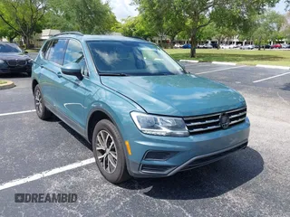 2019 Volkswagen Tiguan SE with VIN 3VV3B7AX8KM171057, listed as a IAAI auction lot 42209509 with 99,437 mi miles and . Bid and sale history available at DreamBid. Image 1.