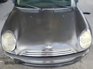 2006 MINI Hardtop with VIN WMWRC33526TK15620, listed as a Copart auction lot 54130715 with 116,981 mi miles and Salvage title. Bid and sale history available at DreamBid. Image 11.