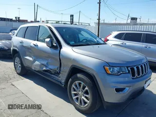 2021 Jeep Grand Cherokee Laredo E with VIN 1C4RJEAG6MC719089, listed as a IAAI auction lot 39290041 with 44,726 mi miles and . Bid and sale history available at DreamBid. Image 1.