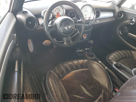 2014 MINI Convertible S with VIN WMWZP3C55ET706573, listed as a Copart auction lot 52325705 with 125,076 mi miles and Salvage Title. Bid and sale history available at DreamBid. Image 8.
