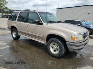 1998 Ford Explorer XL с VIN 1FMZU34E8WUD28654, выставлен на аукционе Copart как лот 50938175 с пробегом 315 748 миль миль и Списание • Salvage title. История ставок и продаж доступна на DreamBid. Изображение 4.