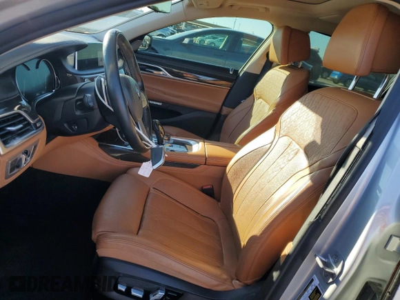 2018 BMW 7 Series 750i with VIN WBA7F0C57JGM23653, listed as a Copart auction lot 43462555 with 62,853 mi miles and Salvage Title. Bid and sale history available at carsss.com. Image 7.