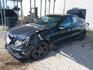 2005 Mercedes-Benz E-Class 3.2L with VIN WDBUF65J05A634879, listed as a IAAI auction lot 39904592 with 4,835 mi miles. Bid and sale history available at carsss.com. Image 2.