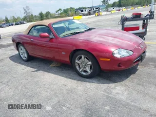 1997 Jaguar XK with VIN SAJGX2743VC017588, listed as a IAAI auction lot 42055716 with 66,052 mi miles and . Bid and sale history available at DreamBid. Image 1.