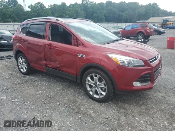 2016 Ford Escape Titanium with VIN 1FMCU9J90GUA02736, listed as a Copart auction lot 63068165 with 23,860 mi miles and Salvage title. Bid and sale history available at DreamBid. Image 4.