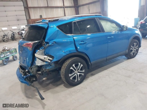 2017 Toyota RAV4 LE with VIN JTMBFREVXHJ156133, listed as a IAAI auction lot 41886714 with 115,127 mi miles. Bid and sale history available at carsss.com. Image 4.