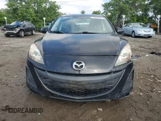 2011 Mazda 3 i Touring z VIN JM1BL1VG0B1487399, wystawiony jako Copart lot #57860375 z przebiegiem 177 755 mil mil oraz Szkoda całkowita • Salvage title. Historia ofert i sprzedaży dostępna na DreamBid. Obrazek 5.