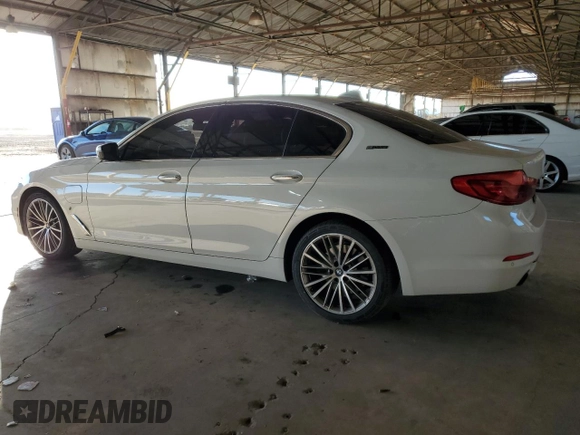 2018 BMW 5 Series 530e with VIN WBAJA9C53JG622997, listed as a Copart auction lot 79959024 with 127,486 mi miles and Salvage title. Bid and sale history available at DreamBid. Image 2.