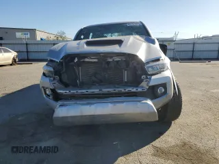 2023 Toyota Tacoma SR with VIN 3TMCZ5AN0PM538974, listed as a Copart auction lot 89165095 with 31,281 mi miles and Salvage title. Bid and sale history available at DreamBid. Image 5.