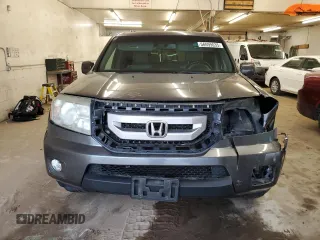 2011 Honda Pilot EX-L z VIN 5FNYF4H62BB040649, wystawiony jako Copart lot #56699035 z przebiegiem 192 874 mil mil oraz Szkoda całkowita • Salvage title. Historia ofert i sprzedaży dostępna na DreamBid. Obrazek 5.