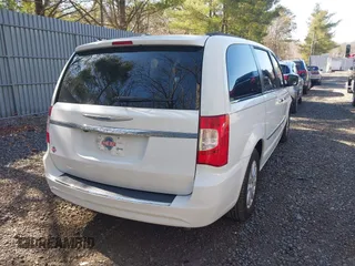 2015 Chrysler Town & Country Touring with VIN 2C4RC1BG4FR755536, listed as a IAAI auction lot 41769040 with 118,393 mi miles and . Bid and sale history available at DreamBid. Image 4.
