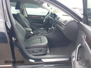 2014 Volkswagen Passat TDI SEL Premium with VIN 1VWCN7A33EC068280, listed as a IAAI auction lot 42086420 with 153,656 mi miles. Bid and sale history available at carsss.com. Image 5.