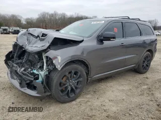2020 Dodge Durango GT with VIN 1C4RDHDG3LC118659, listed as a Copart auction lot 87187394 with 76,937 mi miles and Salvage Title. Bid and sale history available at DreamBid. Image 1.