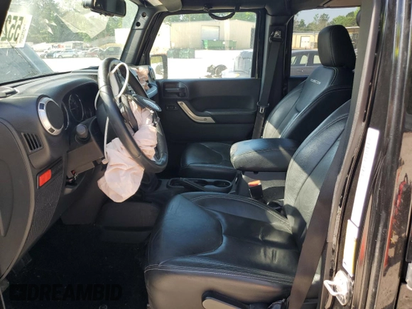2016 Jeep Wrangler Unlimited Rubicon Hard Rock z VIN 1C4BJWFG6GL125252, wystawiony jako Copart lot #55241115 z przebiegiem 193 554 mil mil oraz Szkoda całkowita • Salvage title. Historia ofert i sprzedaży dostępna na DreamBid. Obrazek 7.