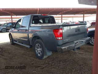 2013 Nissan Titan SL with VIN 1N6AA0ED0DN311415, listed as a IAAI auction lot 42697441 with 150,159 mi miles and . Bid and sale history available at DreamBid. Image 3.