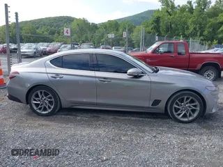 2022 Genesis G70 2.0T with VIN KMTG34TA3NU093020, listed as a IAAI auction lot 42749679 with 64,825 mi miles and . Bid and sale history available at DreamBid. Image 14.