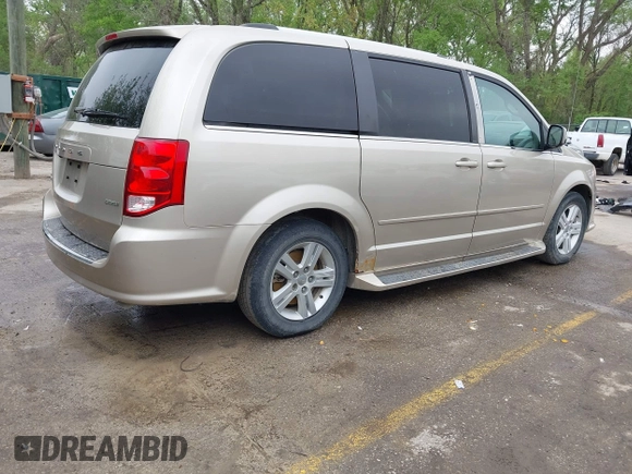 2013 Dodge Grand Caravan Crew with VIN 2C4RDGDG7DR624563, listed as a IAAI auction lot 42038157 with 265,044 mi miles and . Bid and sale history available at DreamBid. Image 4.