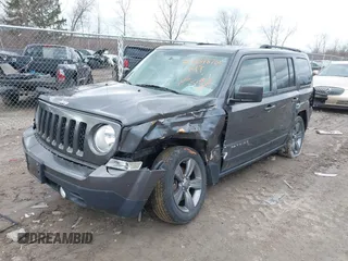 2015 Jeep Patriot High Altitude with VIN 1C4NJPFA2FD297575, listed as a IAAI auction lot 41848731 with 77,149 mi miles and . Bid and sale history available at DreamBid. Image 2.