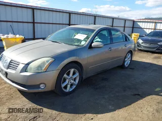 2004 Nissan Maxima SE with VIN 1N4BA41E34C899003, listed as a IAAI auction lot 41951346 with 186,746 mi miles and . Bid and sale history available at DreamBid. Image 2.