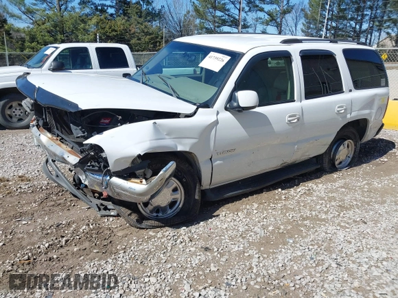 2003 GMC Yukon SLT with VIN 1GKEC13Z33R171861, listed as a IAAI auction lot 41739226 with 230,139 mi miles. Bid and sale history available at carsss.com. Image 2.
