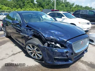 2016 Jaguar XJ Portfolio z VIN SAJWA2G73G8V92934, wystawiony jako IAAI lot #42557171 z przebiegiem 106 413 mil mil oraz . Historia ofert i sprzedaży dostępna na DreamBid. Obrazek 1.