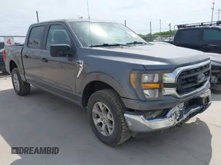 2023 Ford F-150 XL with VIN 1FTFW1E87PKF04735, listed as a IAAI auction lot 42048913 with 54,893 mi miles. Bid and sale history available at carsss.com. Image 1.