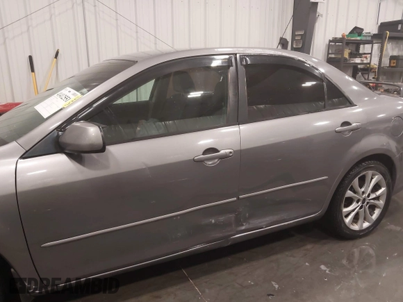 2006 Mazda 6 i with VIN 1YVFP80C865M23087, listed as a IAAI auction lot 41412551 with 148,395 mi miles and . Bid and sale history available at carsss.com. Image 6.