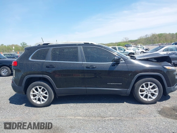 2017 Jeep Cherokee Latitude with VIN 1C4PJLCB1HW596240, listed as a IAAI auction lot 42092862 with 105,087 mi miles and . Bid and sale history available at DreamBid. Image 13.