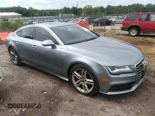 2013 Audi A7 Prestige with VIN WAU2GAFC0DN075637, listed as a IAAI auction lot 42710903 with 145,562 mi miles and . Bid and sale history available at DreamBid. Image 1.