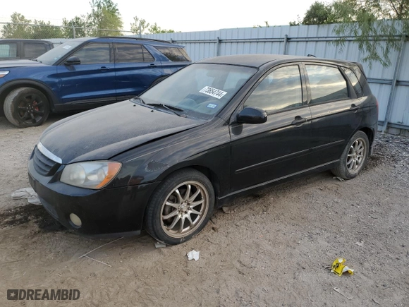 2005 Kia Spectra with VIN KNAFE161255088283, listed as a Copart auction lot 73654744 with 169,947 mi miles and Salvage Title. Bid and sale history available at carsss.com. Image 1.