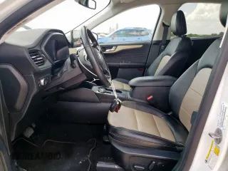 2021 Ford Escape Titanium Hybrid z VIN 1FMCU0DZ6MUA03327, wystawiony jako Copart lot #59558845 z przebiegiem 67 569 mil mil oraz Czysty tytuł • Clean title. Historia ofert i sprzedaży dostępna na DreamBid. Obrazek 7.