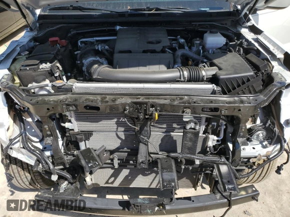2023 Nissan Frontier Pro-X with VIN 1N6ED1EJ1PN672564, listed as a Copart auction lot 49304865 with 13,575 mi miles and Salvage title. Bid and sale history available at DreamBid. Image 11.