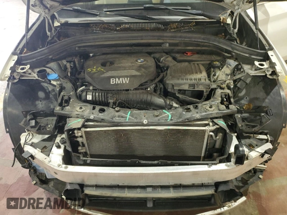 2017 BMW X1 xDrive28i with VIN WBXHT3Z34H4A54811, listed as a Copart auction lot 63584405 with 92,699 mi miles and Salvage title. Bid and sale history available at DreamBid. Image 12.