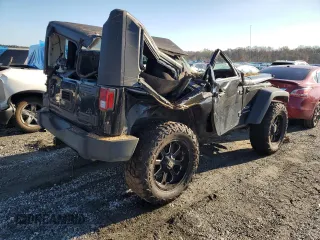 2015 Jeep Wrangler Willys Wheeler with VIN 1C4AJWAG8FL648645, listed as a Copart auction lot 74334884 with Not provided miles and Salvage title. Bid and sale history available at DreamBid. Image 3.