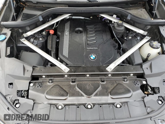 2021 BMW X5 z VIN NJ1541E, wystawiony jako Copart lot #37990264 z przebiegiem 18 321 mil mil oraz Szkoda całkowita • Salvage title. Historia ofert i sprzedaży dostępna na DreamBid. Obrazek 12.