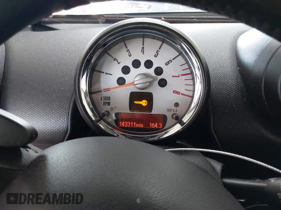 2013 MINI Countryman S with VIN WMWZC3C56DWP24170, listed as a IAAI auction lot 42366594 with 143,311 mi miles and . Bid and sale history available at DreamBid. Image 7.