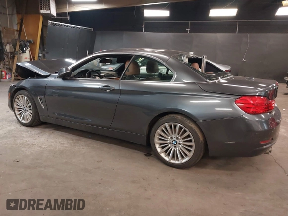 2014 BMW 4 Series 428i xDrive with VIN WBA3T1C59EPS98299, listed as a IAAI auction lot 41741235 with 93,000 mi miles and . Bid and sale history available at carsss.com. Image 3.