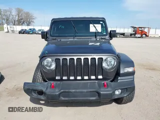 2019 Jeep Wrangler Unlimited Sport S with VIN 1C4HJXDG0KW541940, listed as a IAAI auction lot 42100255 with 68,309 mi miles and . Bid and sale history available at DreamBid. Image 13.