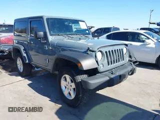 2014 Jeep Wrangler Sport with VIN 1C4AJWAGXEL177449, listed as a IAAI auction lot 41741519 with 117,056 mi miles and . Bid and sale history available at carsss.com. Image 1.