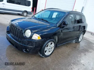 2007 Jeep Compass Sport with VIN 1J8FT47W57D119595, listed as a IAAI auction lot 41782027 with 223,203 mi miles. Bid and sale history available at carsss.com. Image 2.