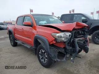 2016 Toyota Tacoma SR with VIN 3TMCZ5AN1GM043859, listed as a IAAI auction lot 41950061 with 148,847 mi miles and . Bid and sale history available at DreamBid. Image 1.