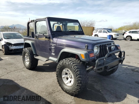 1999 Jeep Wrangler Sport with VIN 1J4FY19S0XP467587, listed as a Copart auction lot 51339415 with 168,142 mi miles and Clean Title. Bid and sale history available at carsss.com. Image 4.