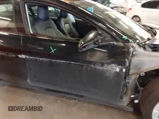 2022 Tesla Model 3 with VIN 5YJ3E1EA4NF187113, listed as a IAAI auction lot 41712331 with 81,879 mi miles and . Bid and sale history available at DreamBid. Image 22.