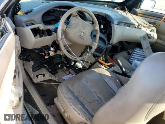 2003 Toyota Solara SE z VIN 2T1CF28P33C607349, wystawiony jako Copart lot #51933765 z przebiegiem Nie podano mil oraz Szkoda całkowita • Salvage title. Historia ofert i sprzedaży dostępna na DreamBid. Obrazek 8.