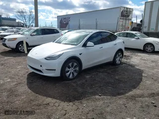 2021 Tesla Model Y Long Range with VIN 5YJYGDEEXMF283914, listed as a IAAI auction lot 41661936 with 53,212 mi miles. Bid and sale history available at carsss.com. Image 16.
