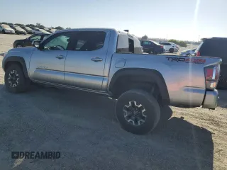 2023 Toyota Tacoma SR with VIN 3TMCZ5AN3PM645372, listed as a Copart auction lot 59917365 with 27,146 mi miles and Salvage title. Bid and sale history available at DreamBid. Image 2.